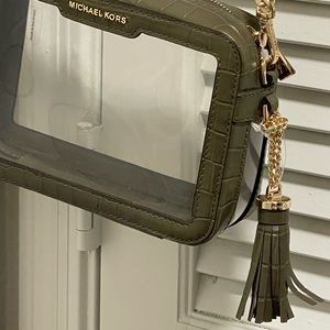 Clear Michael Kors Crossbody bag with green snakeskin. Bag measures 28jn Length